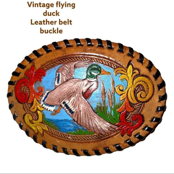 Vintage embossed leather flying duck belt buckle!